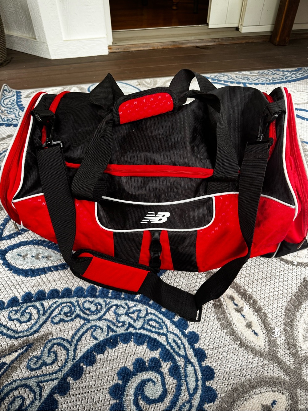 NWOT New Balance Medium Red and Black Duffel Bag
